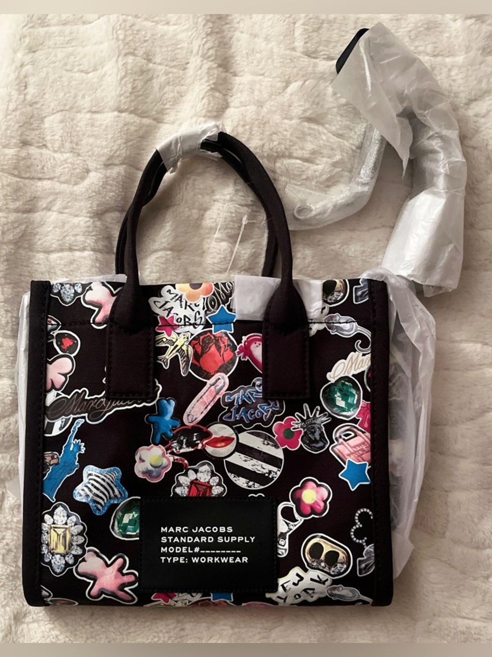 Marc Jacobs sticker print canvas tote bag.